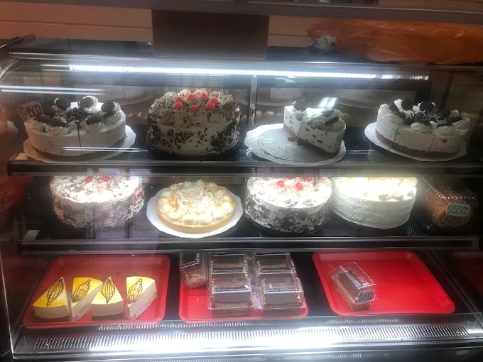 Vitrina de tortas y porciones